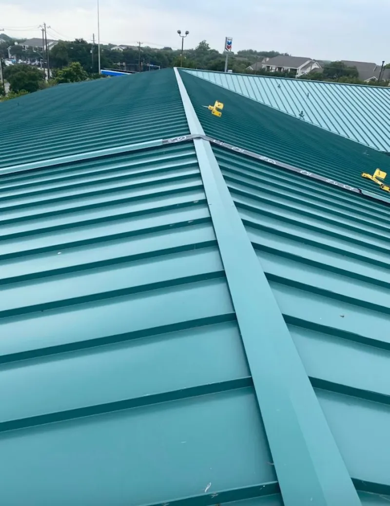 Green commercial metal roof ridge and valley for Metal Roof Repair in Beachwood