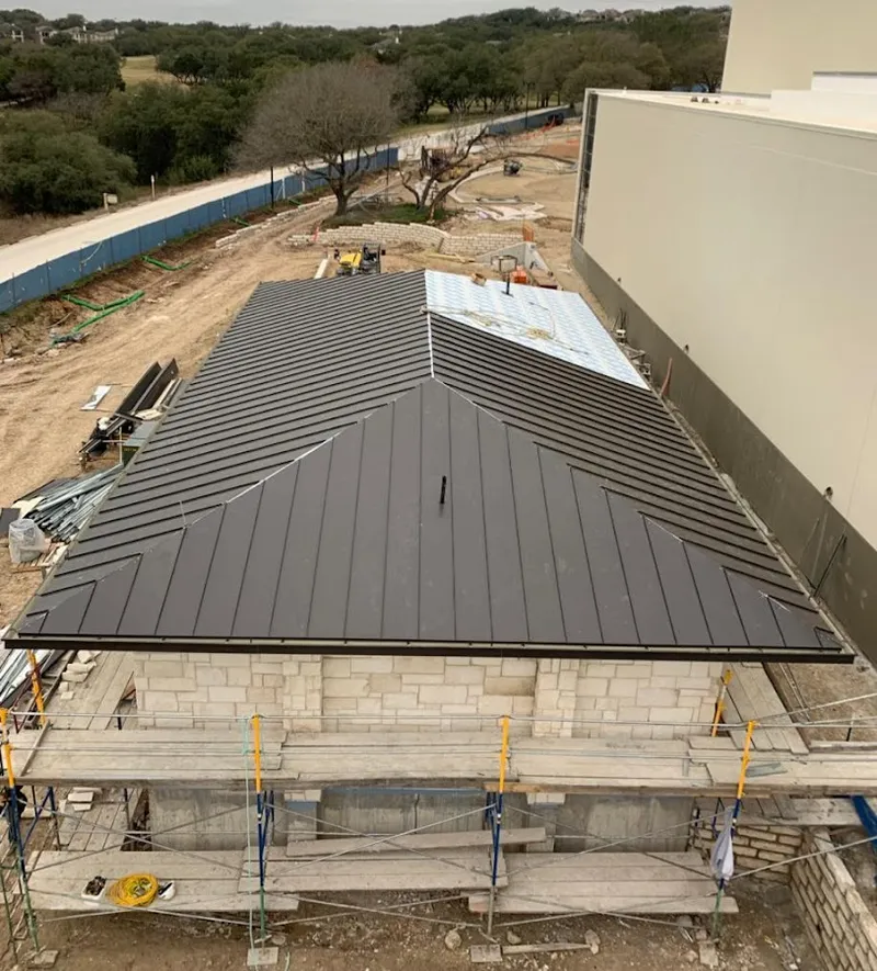 Metal roof new construction with scaffolding in Beachwood
