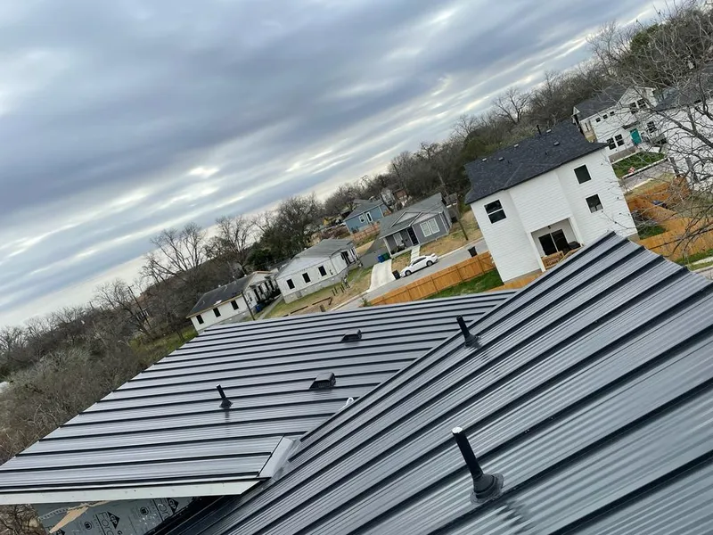 Standing seam metal roof panels with vents for Skylight Repair in Beachwood